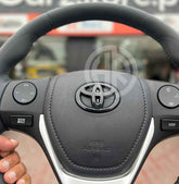 Toyota Corolla Glossy Black Steering Emblem Sporty & Stylish Interior Accessory